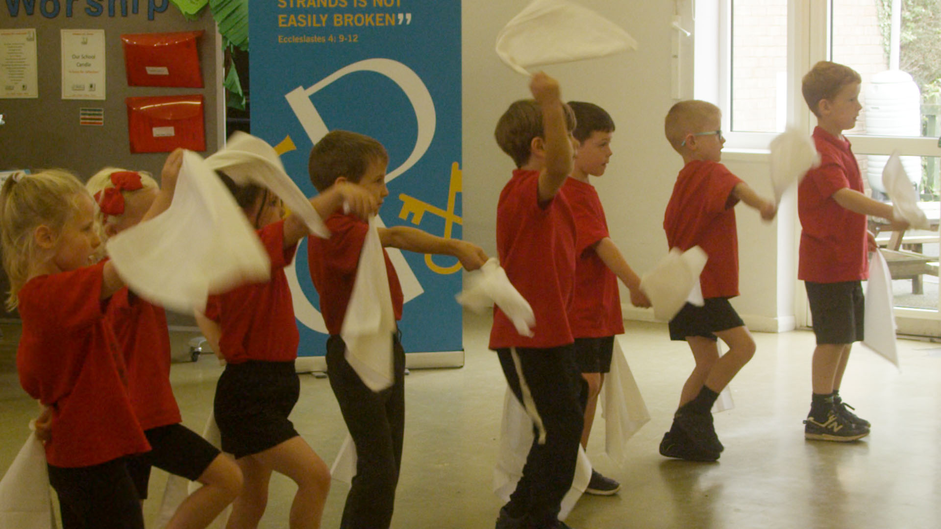 School children performing morris dancing